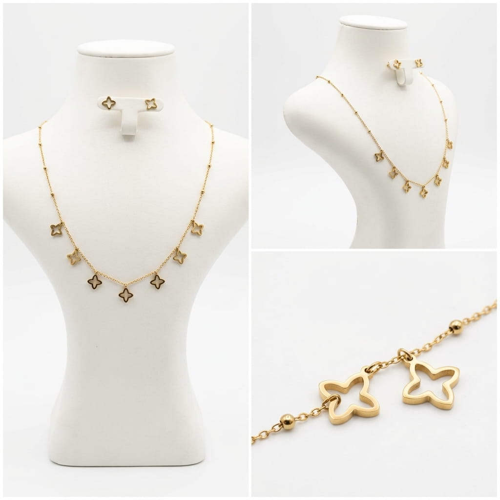Ensemble collier et boucles d'oreilles trèfles dorés.